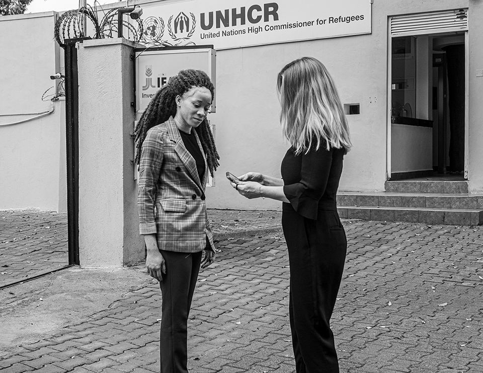 Chantale Zuzi and Alisa Roadcup in front of UNHCR building